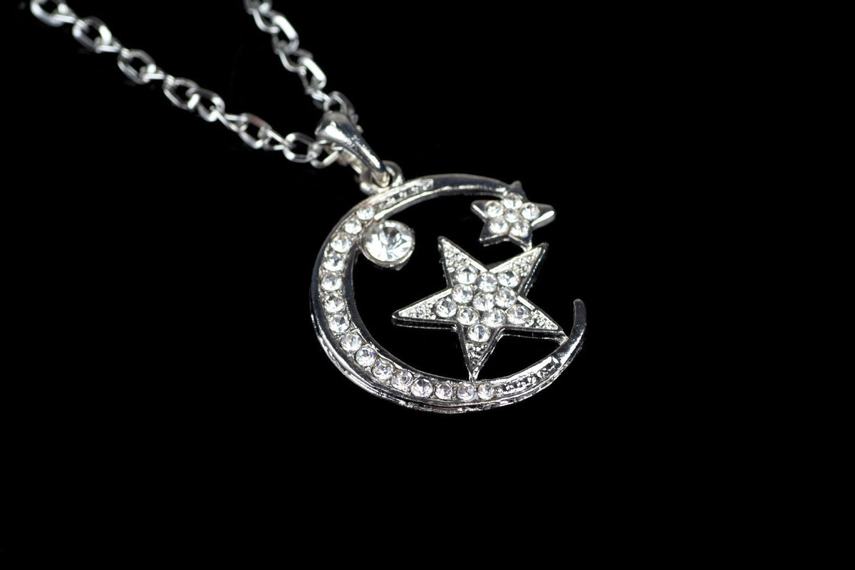 UPSCALE FASHION INLAID CRYSTAL MOON AND STARS PENDANT NECKLACE